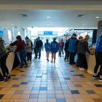 People attending Family Weekend Pancake Breakfast in Kirkhof Center lobby.
